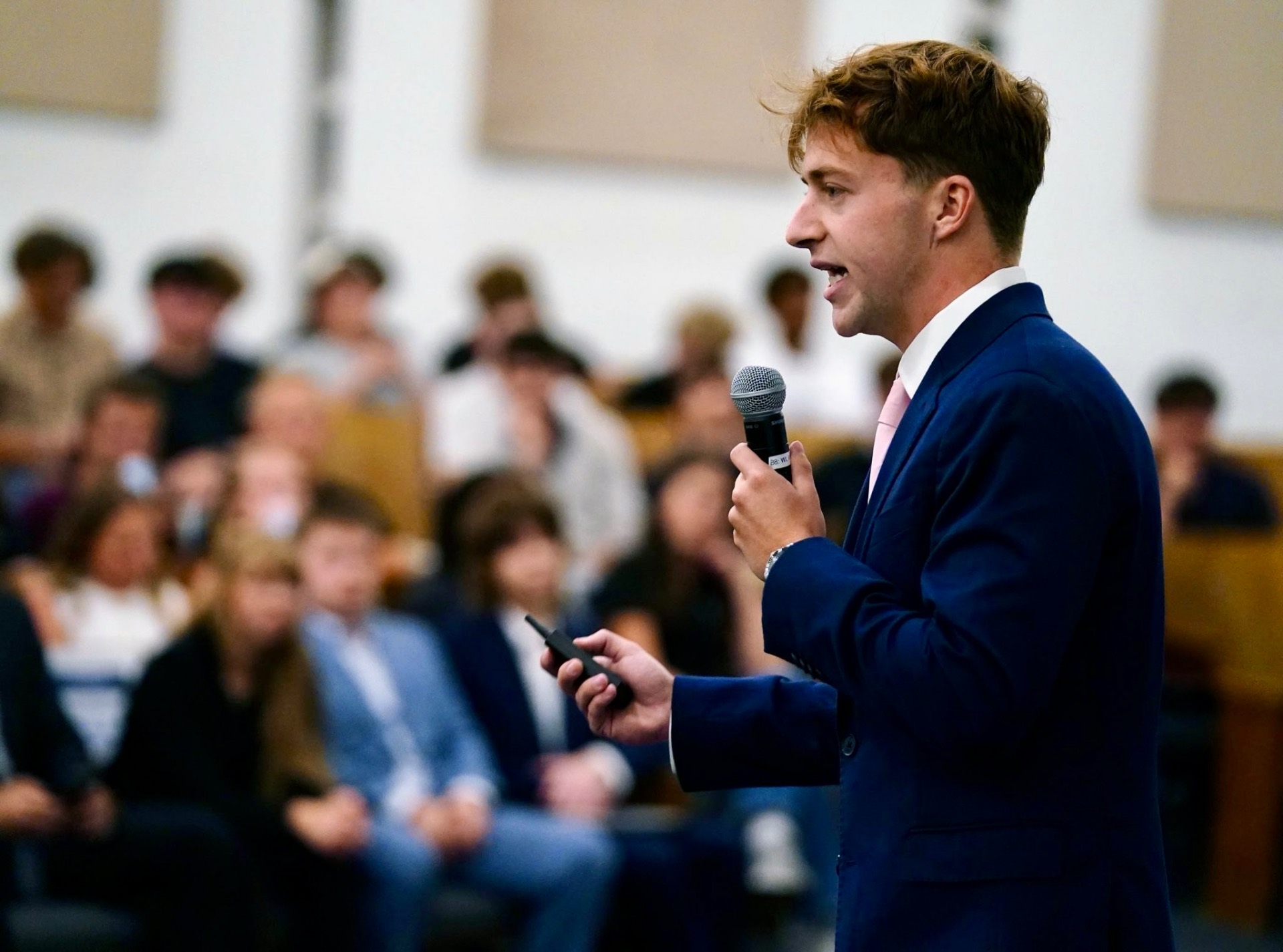 Walker Wood speaking to a live audience